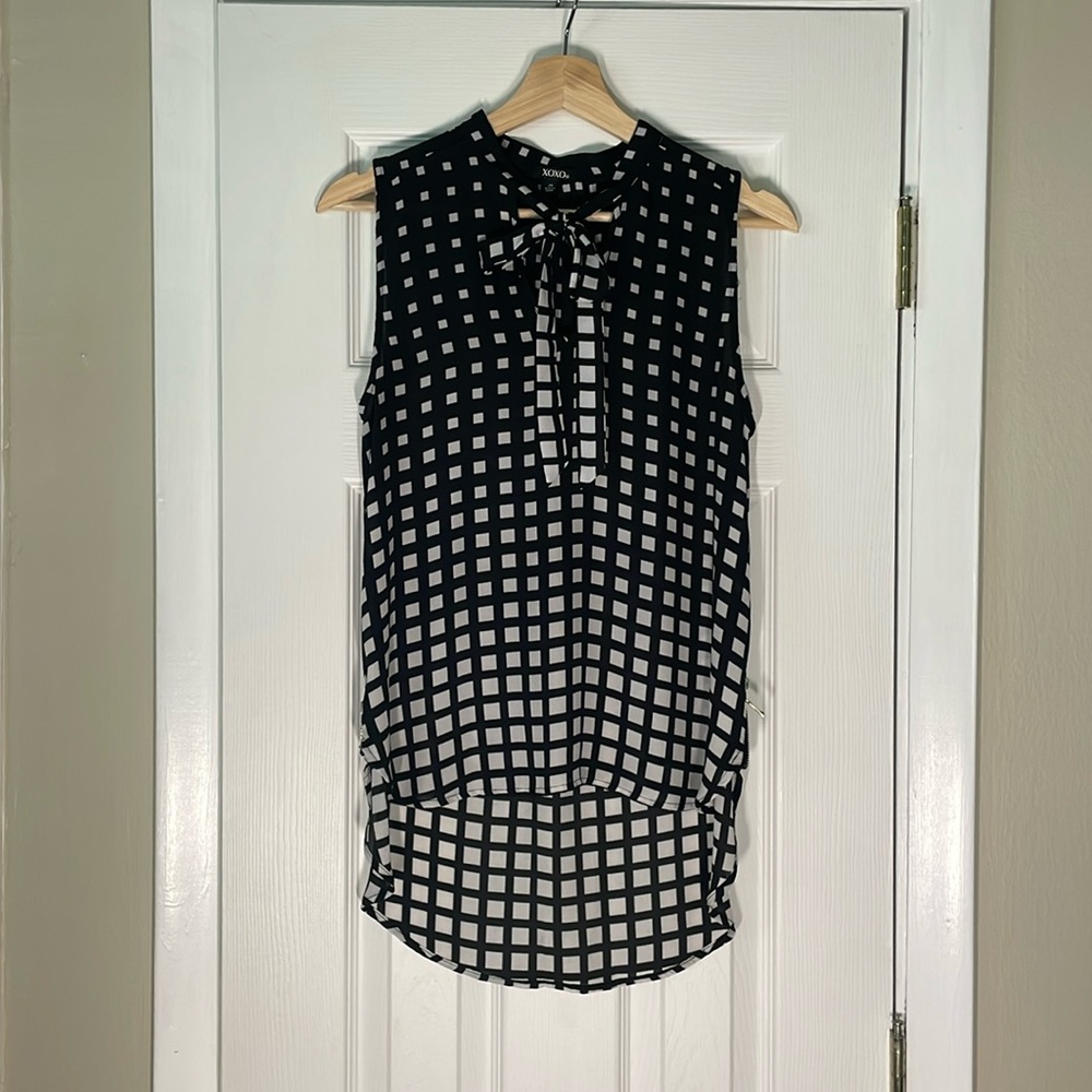 XOXO high-low sleeveless work shirt
